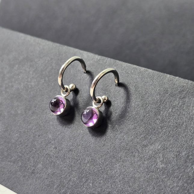 Zilveren verwisselbare oorbellen met amethist
